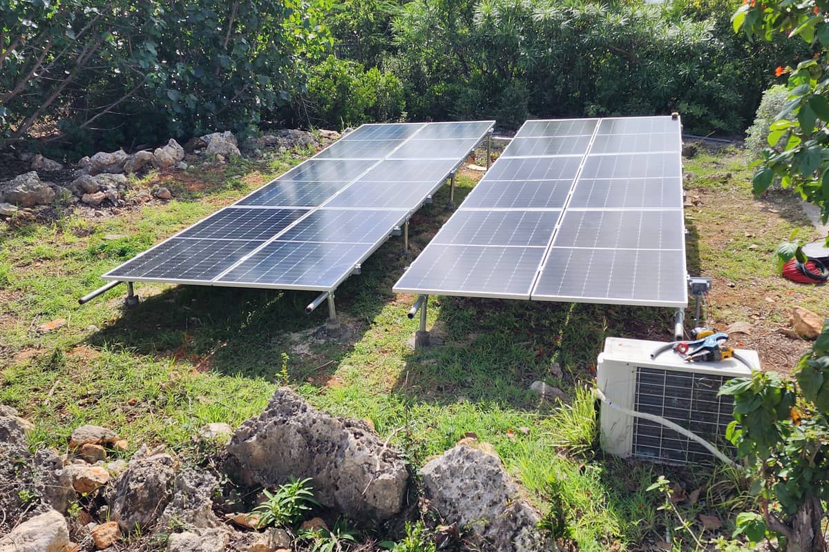 Completed ground-mounted solar array on a residential plot